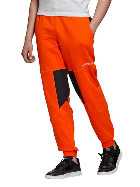 adidas jogginghose außen schwarz innen oranges netz|orange Jogginghosen .